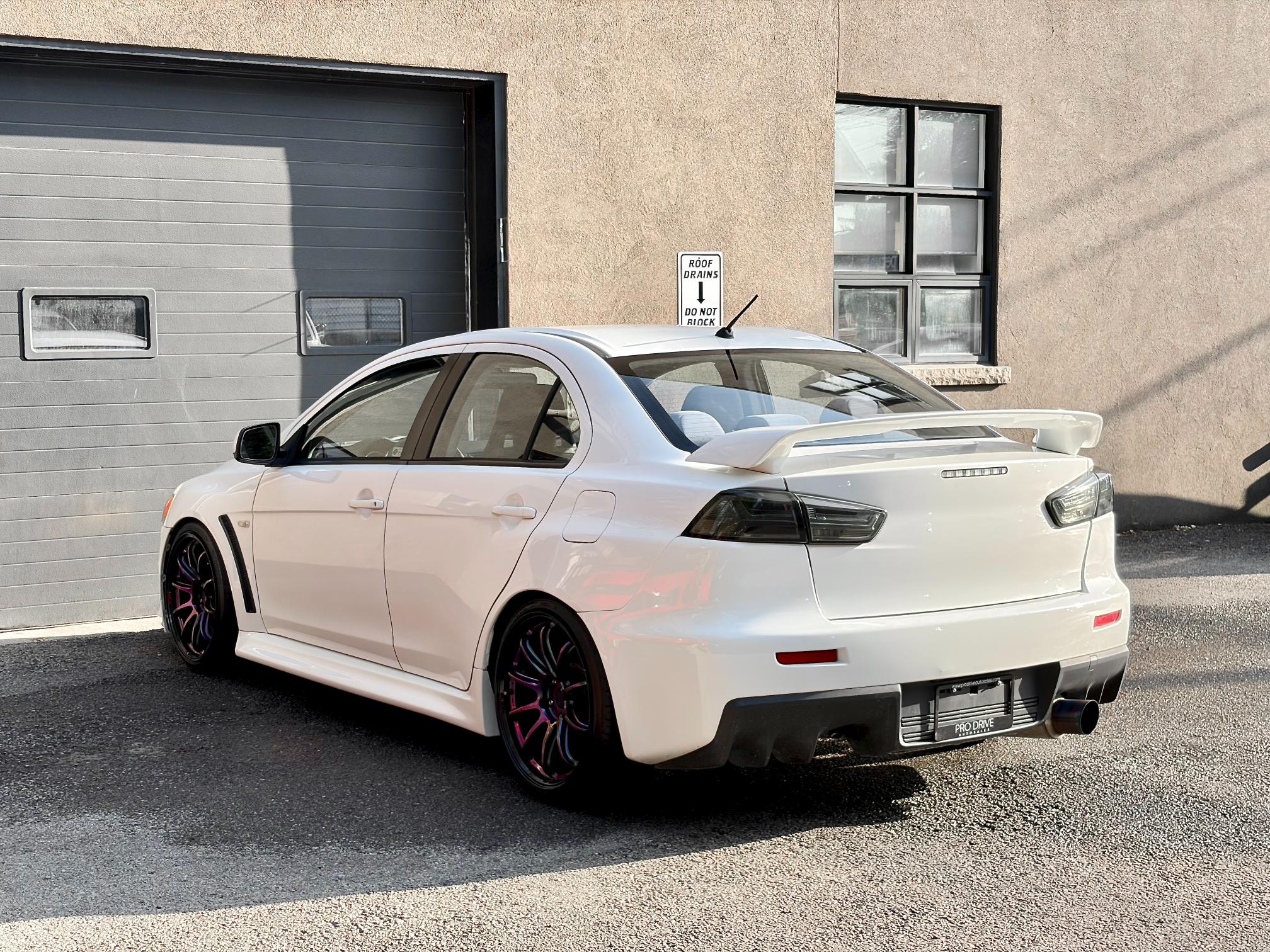 
								2010 Mitsubishi Lancer Evolution X GSR full									