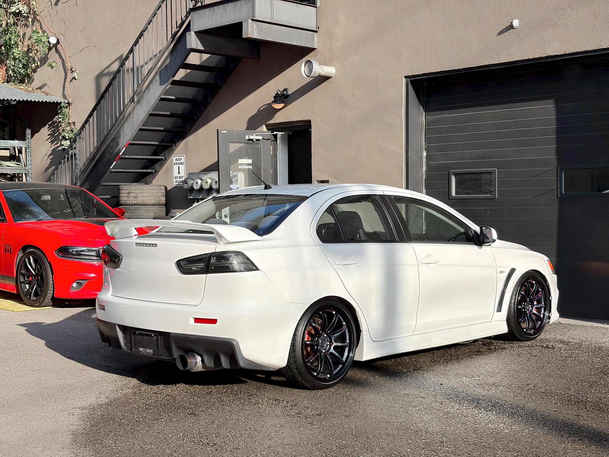 
								2010 Mitsubishi Lancer Evolution X GSR full									